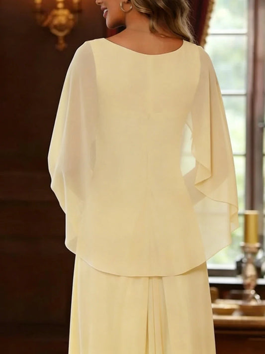 Yellow chiffon maxi dress back with draped cape sleeves and flowing A-line skirt