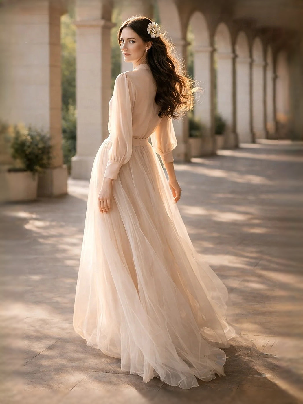 Champagne chiffon A-line maxi gown with high neckline and flowing skirt