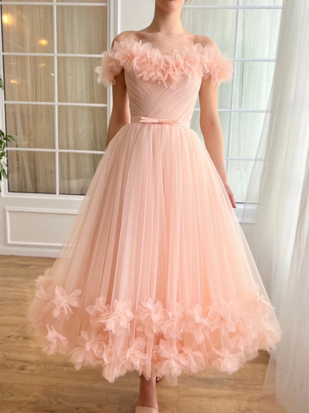 Peach A-line midi prom dress with off-shoulder ruffle sleeves and layered tulle hem