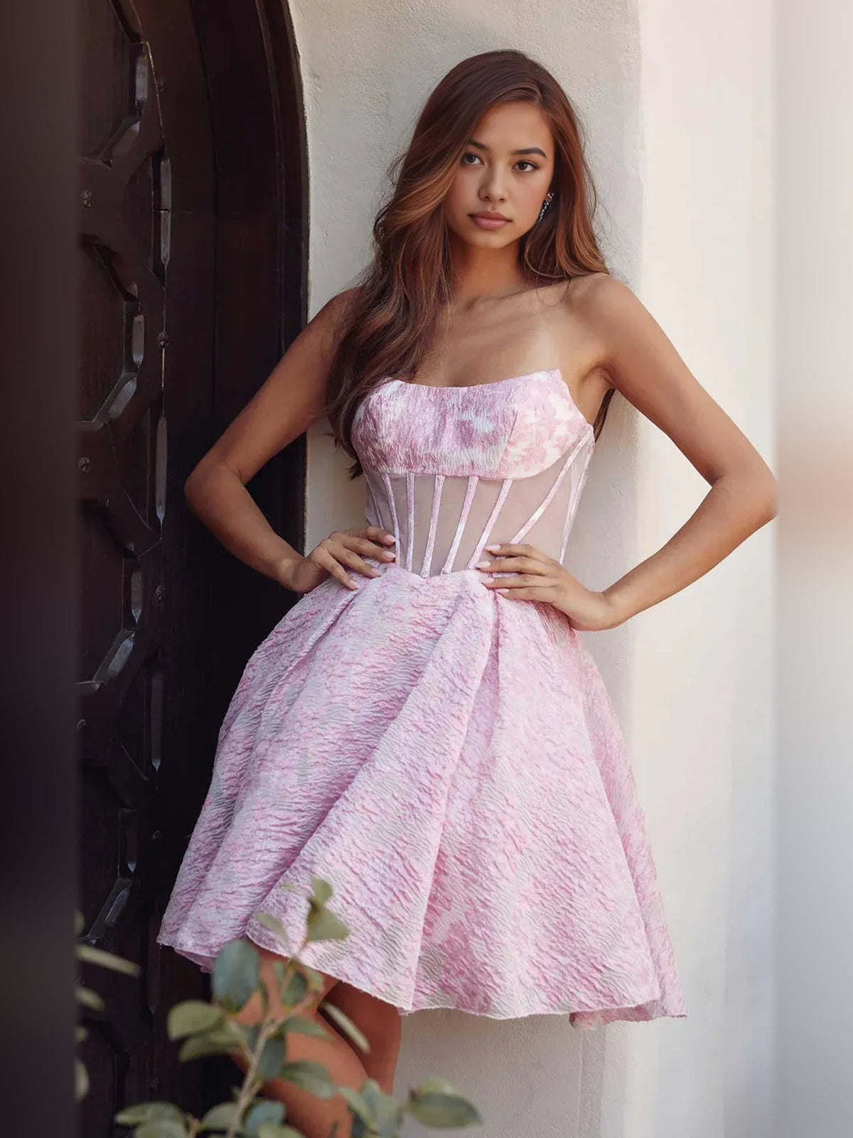 Pink strapless corset A-line short dress with fitted waist and ruffled bust detail