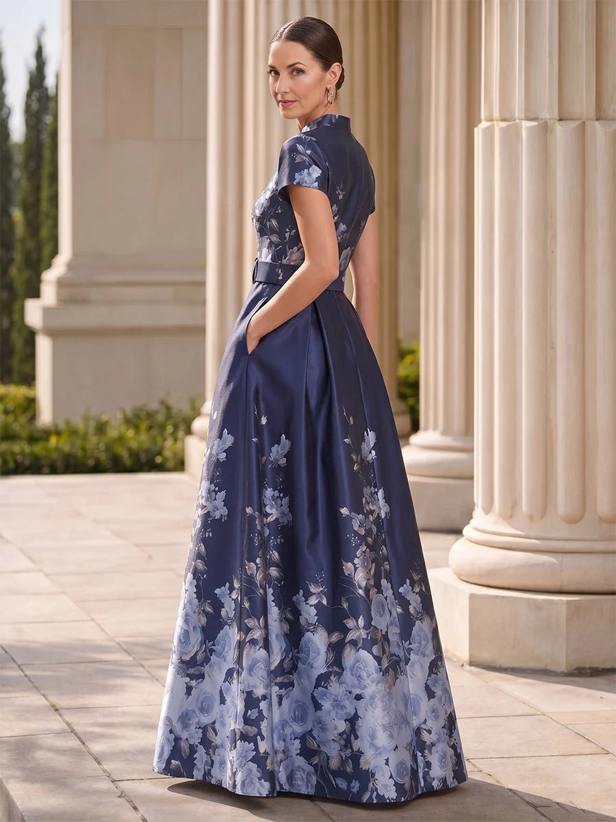 Dark blue floral satin high-neck A-line maxi dress, front slit, side view