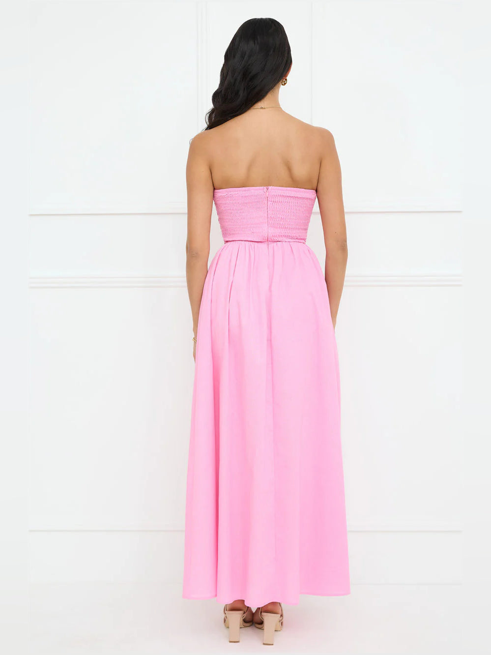 Pink strapless A-line maxi dress, back view, ruched bodice