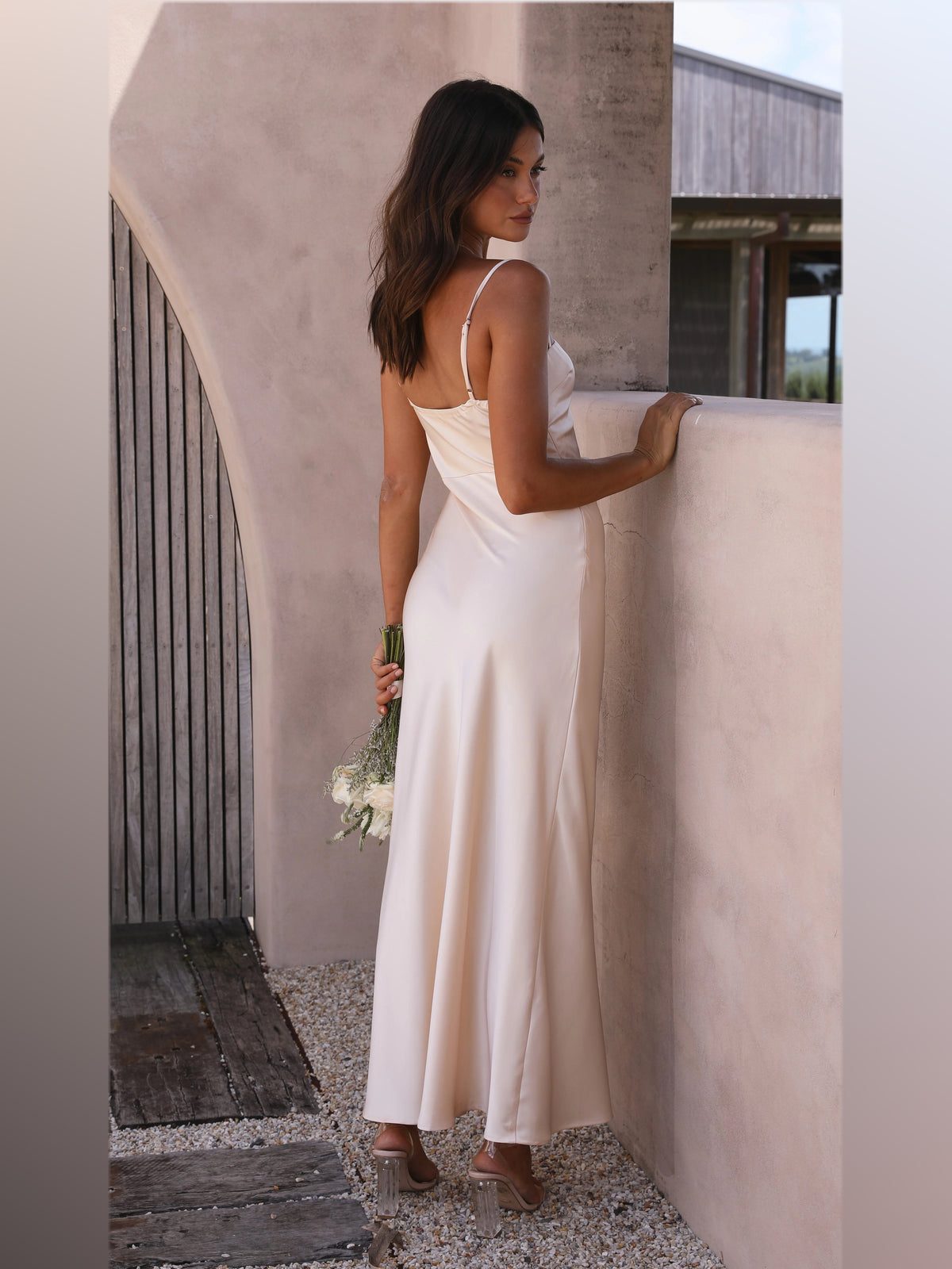 Gold maxi formal dress, back full-length view showing the bodice