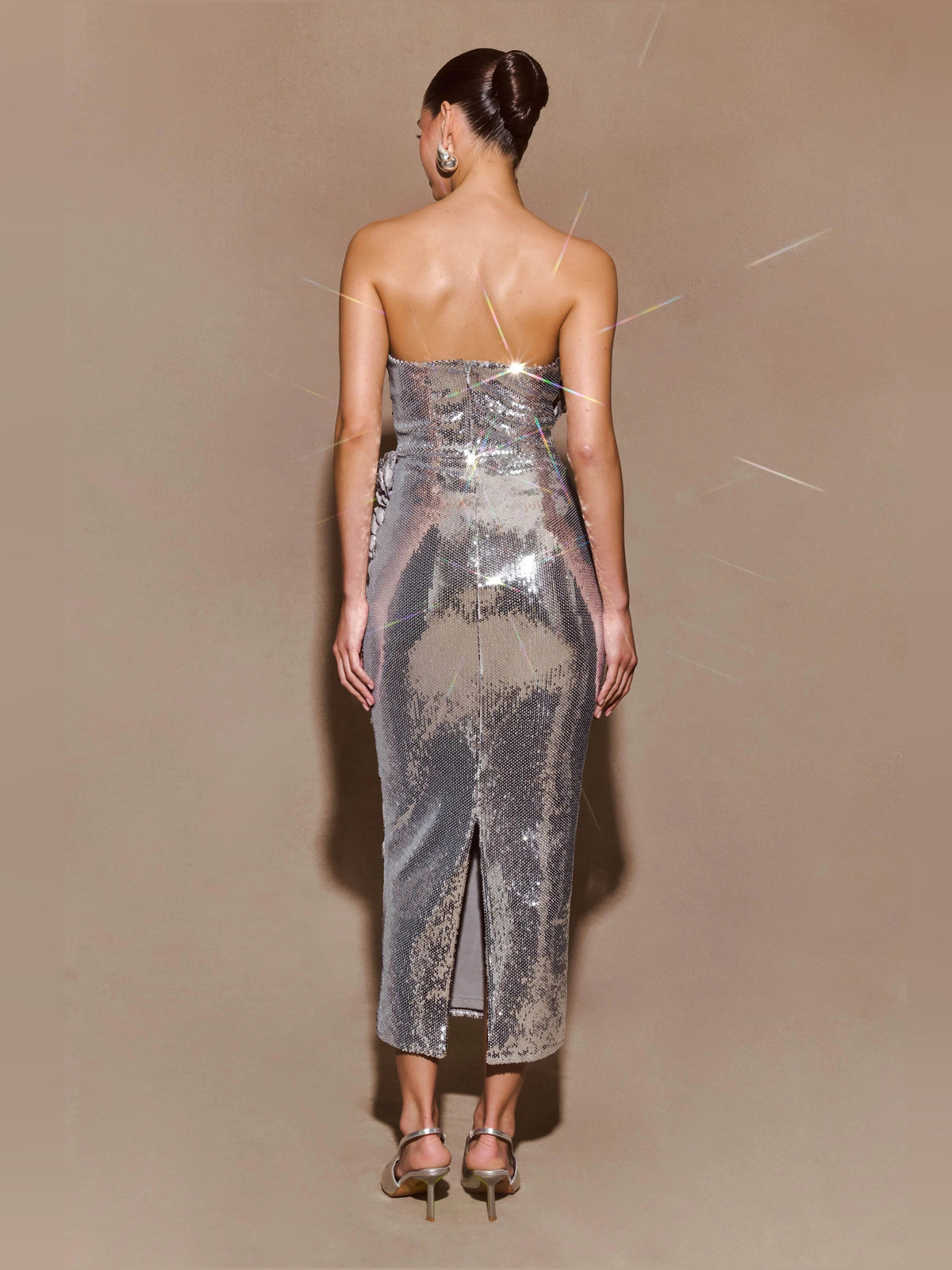 Silver strapless sequin midi formal dress, back view with open-back design