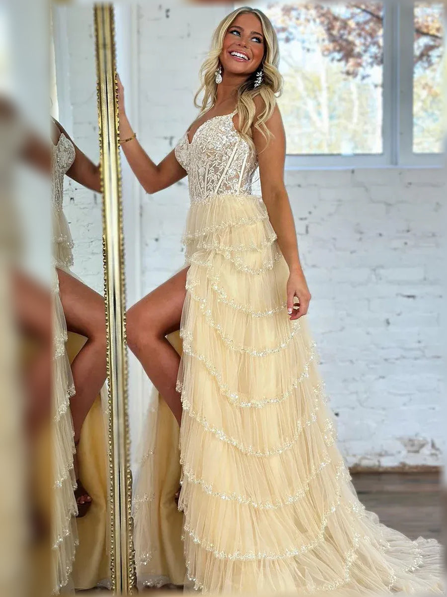 Champagne tiered formal dress with sweetheart corset, sleeveless straps, and layered ruffles