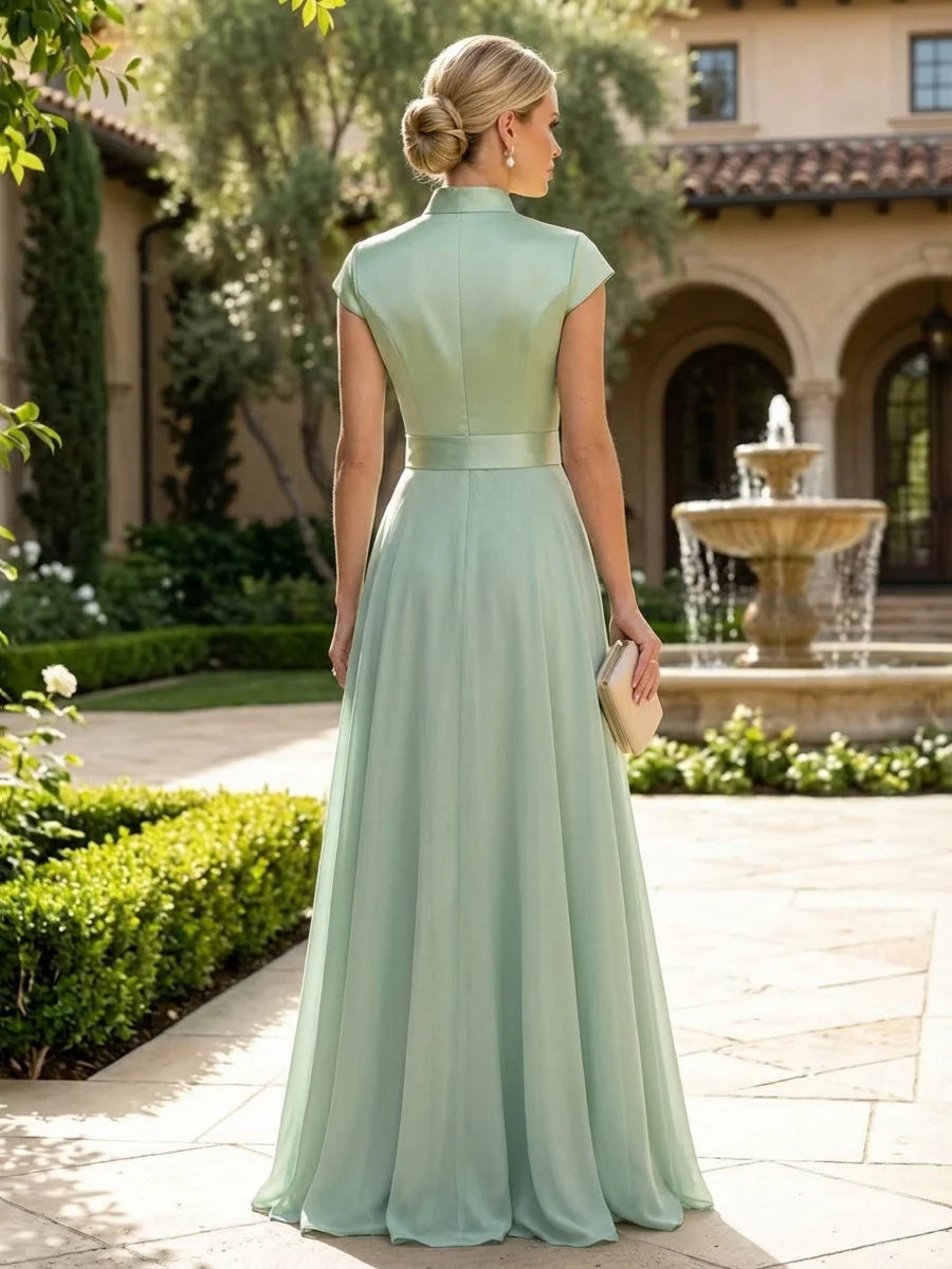 Mint green satin A-line mother-of-the-bride dress from back view, high neckline, sleeveless