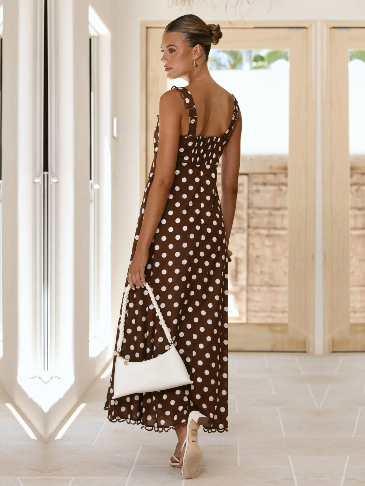 Brown a-line maxi formal dress with printed pattern, full-length back view