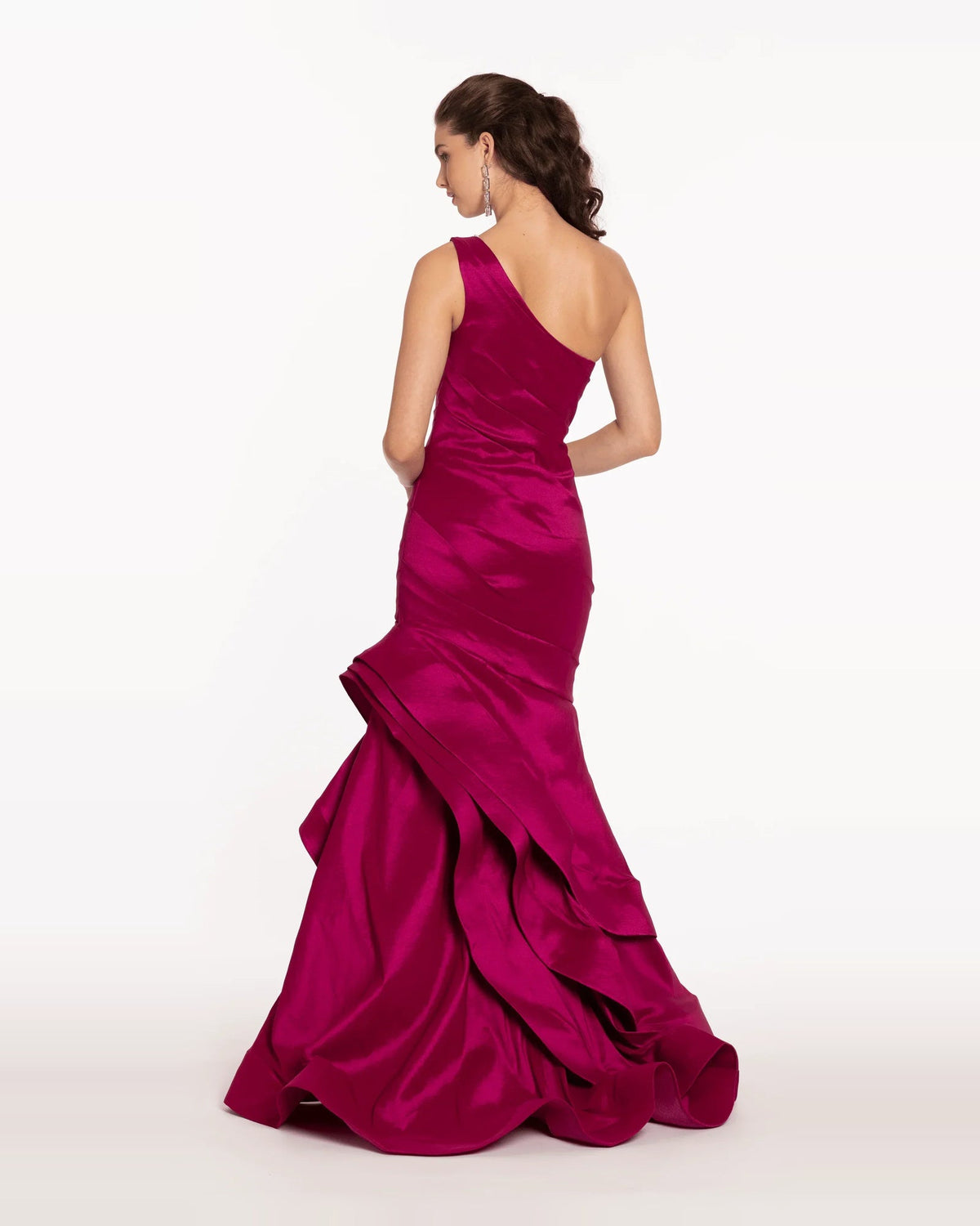 One-shoulder mermaid maxi prom dress in magenta, back view with tiered ruffles