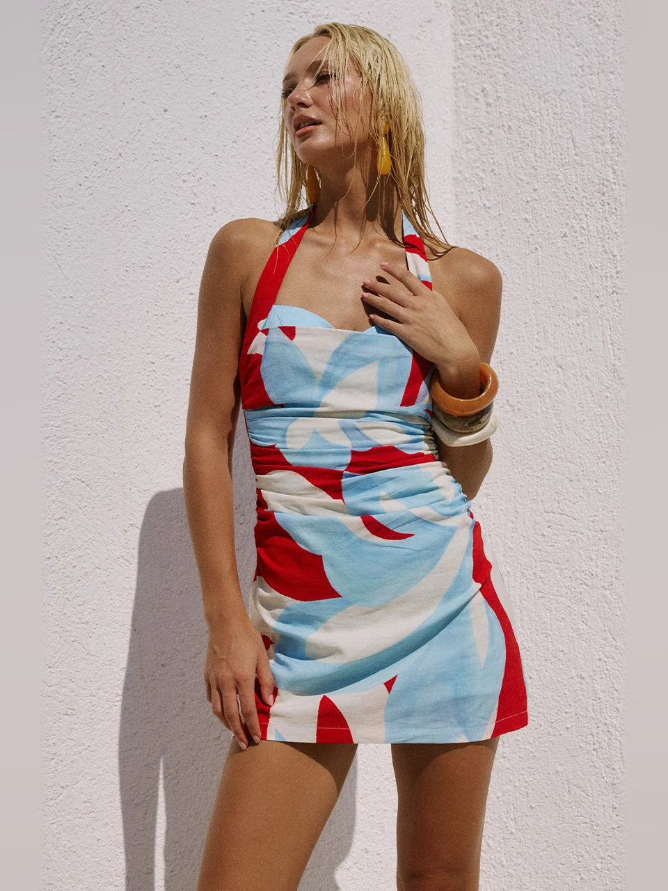 Sweetheart mini homecoming dress, side view, sleeveless abstract red and light-blue print