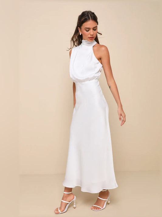 White satin sleeveless high-neck midi dress, side view with gathered waist detail