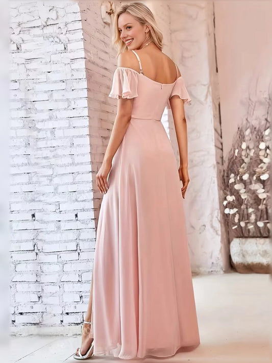 Coral blush A-line maxi dress with thin straps, off-shoulder ruffle sleeves, and side slit