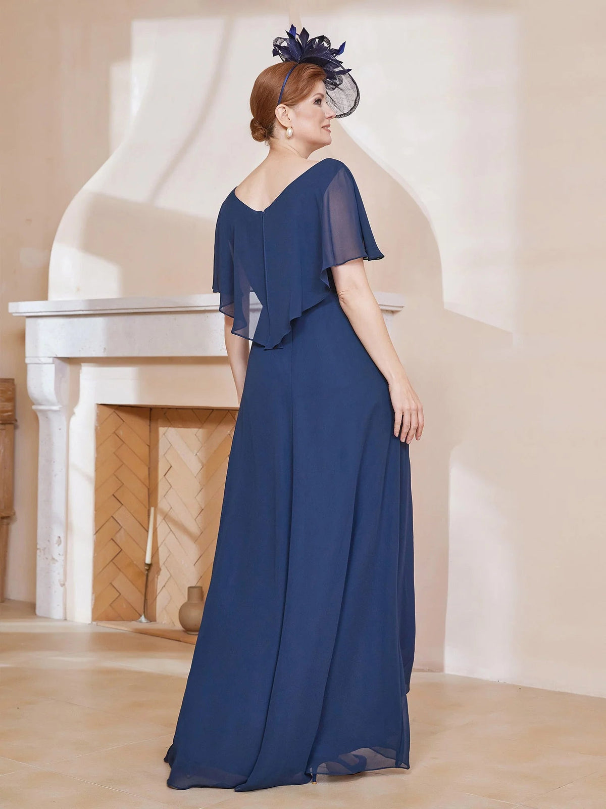 Dark navy V-neck chiffon high-low formal dress with flowing flutter sleeves