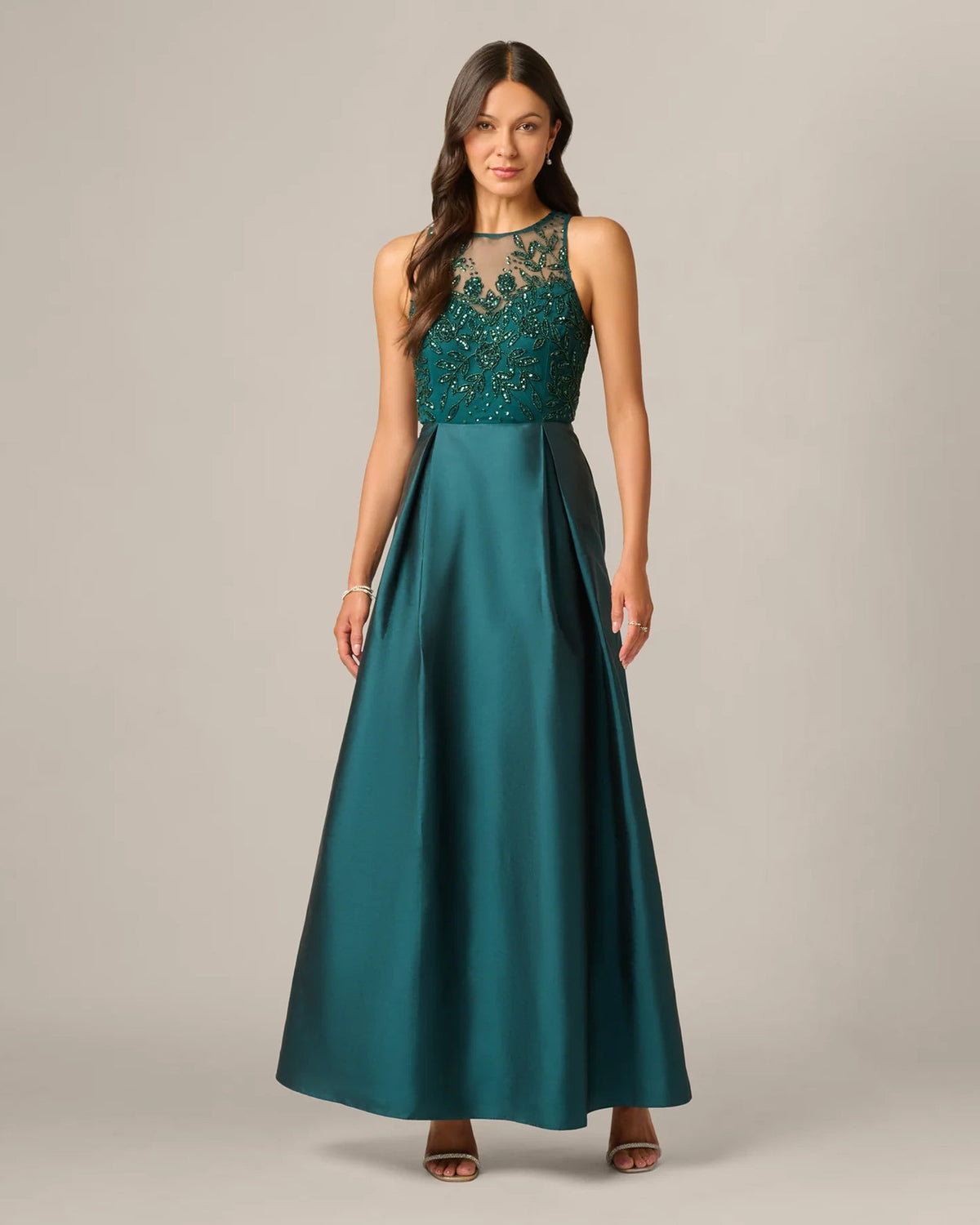 Teal green sleeveless A-line maxi dress with beaded neckline bodice and full skirt