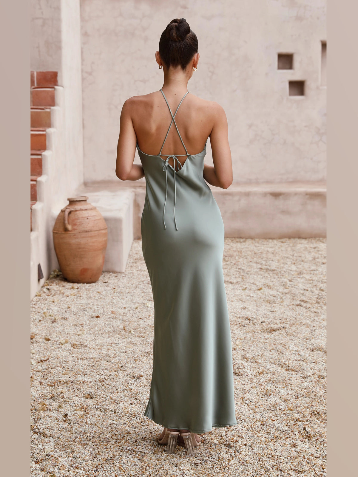 Green maxi formal dress, back full-length view showing the bodice