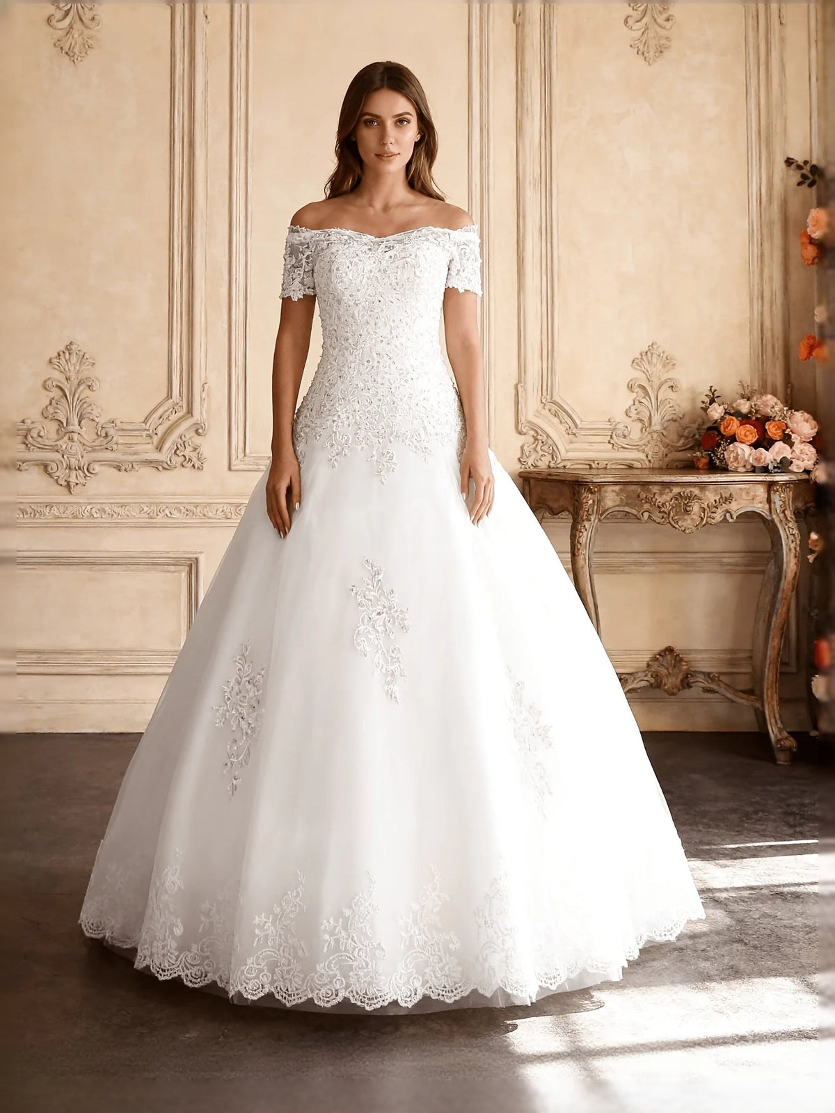 Ivory off-shoulder lace wedding dress with fitted bodice and full tulle ball skirt
