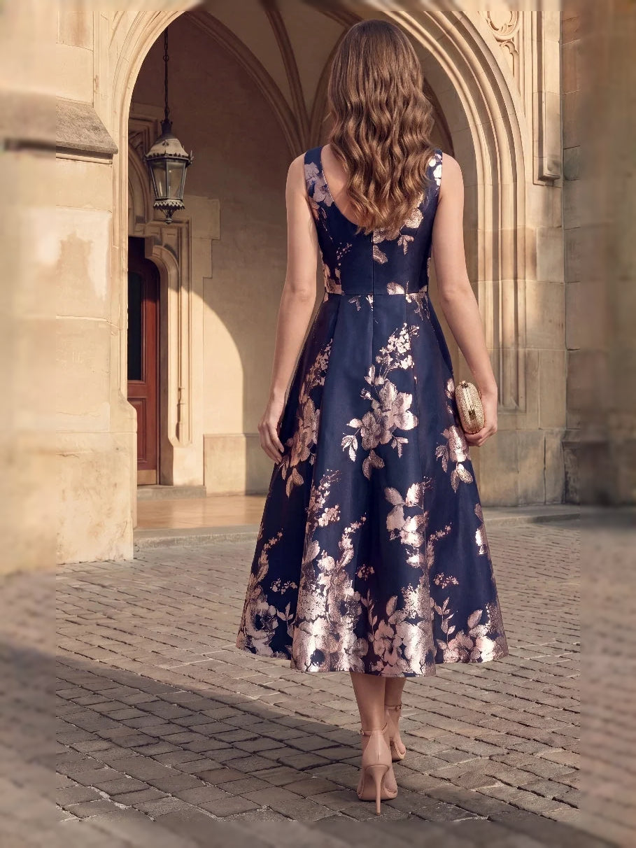 Floral A-line tea-length dress, dark blue back view, sleeveless V-neck, flared skirt