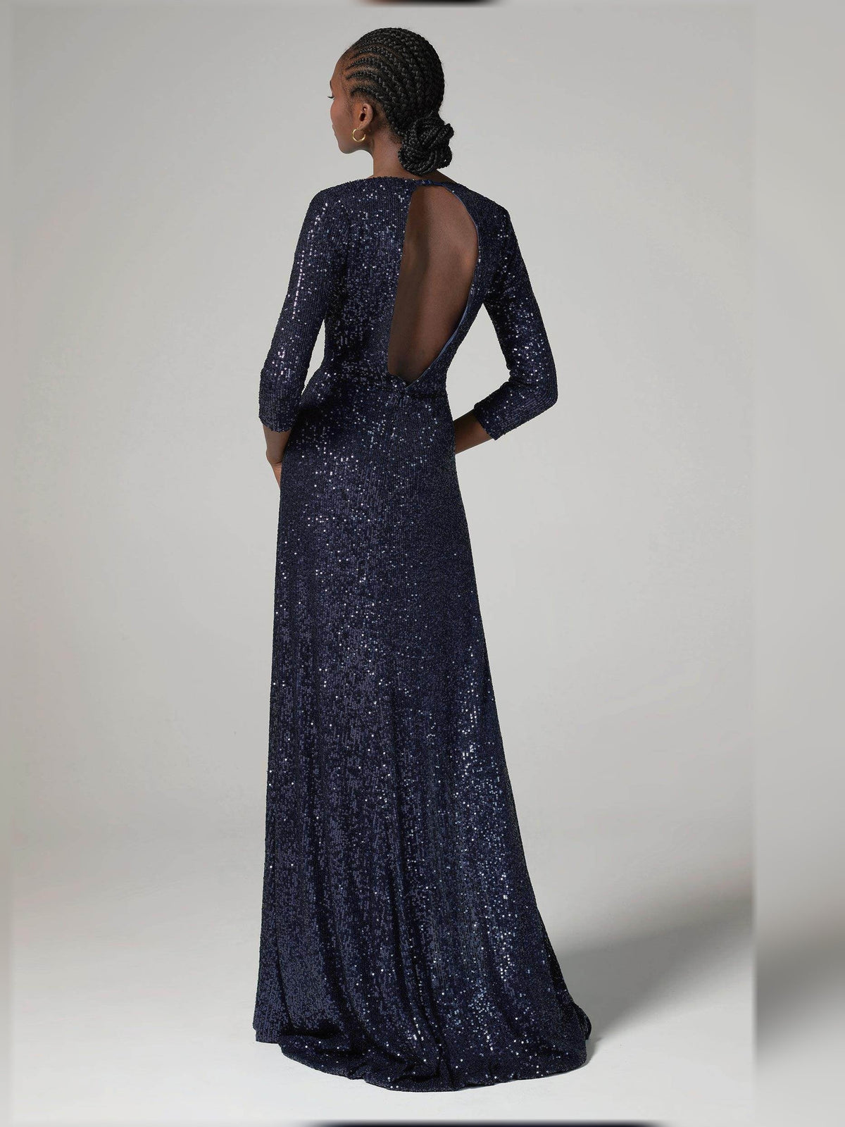 Dark navy sequin formal dress with open back, V-neck, long sleeves, floor length