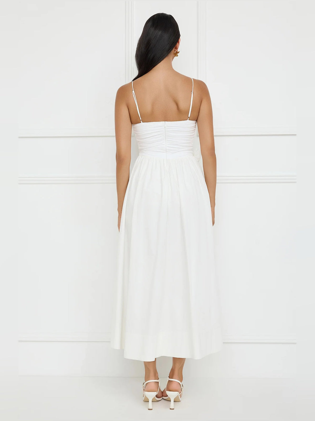 White a-line maxi formal dress with floral appliqué, full-length back view