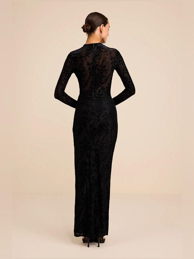 Black sheath maxi formal dress with skirt slit, full-length back view