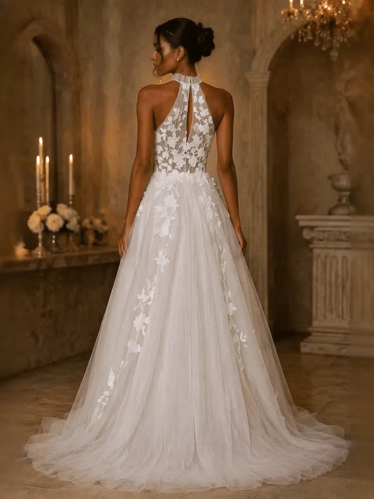 Ivory halter backless A-line tulle wedding dress with lace floral panel and train