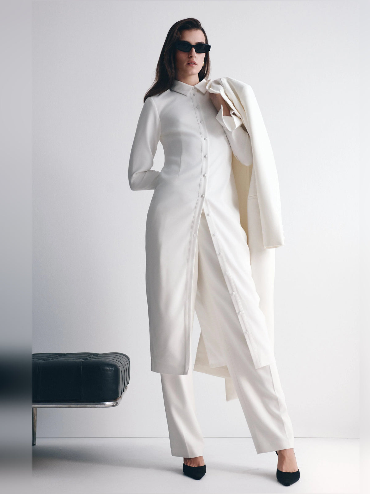 White fitted midi shirt dress, long sleeves and button front; pointed collar