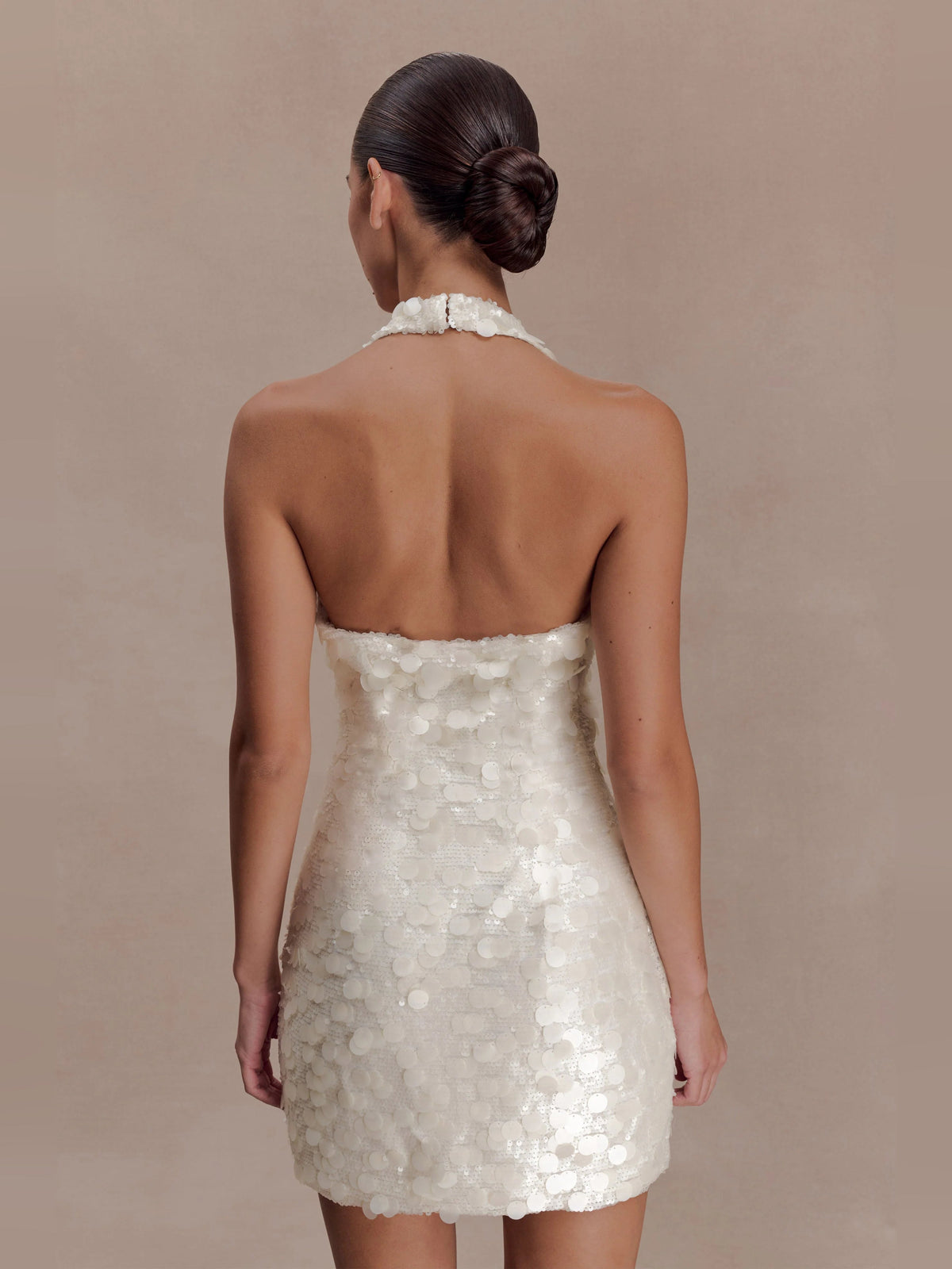 Ivory sequin mini dress, open back with halter strap and scalloped neckline