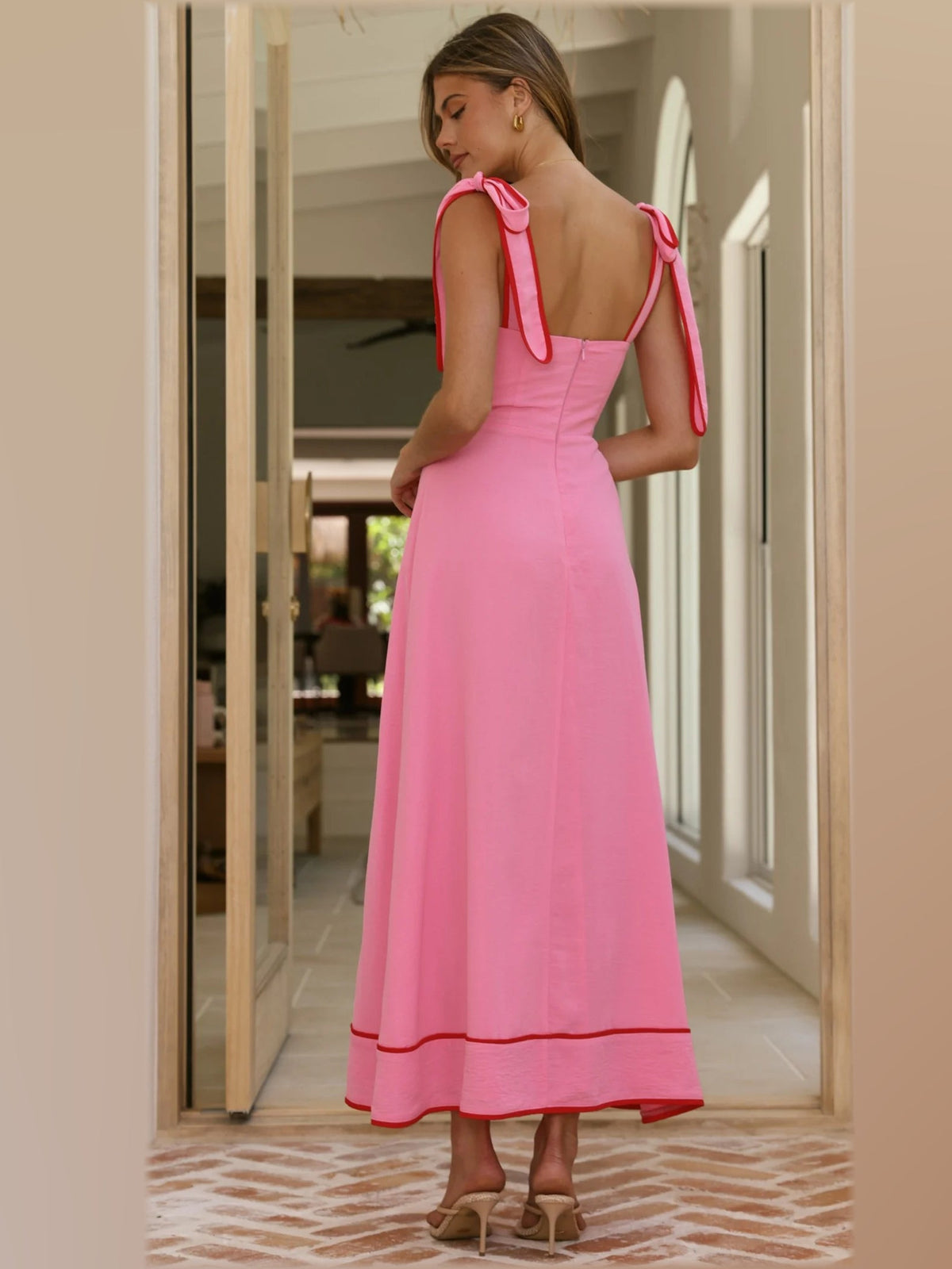 Pink midi formal dress, back full-length view showing the bodice