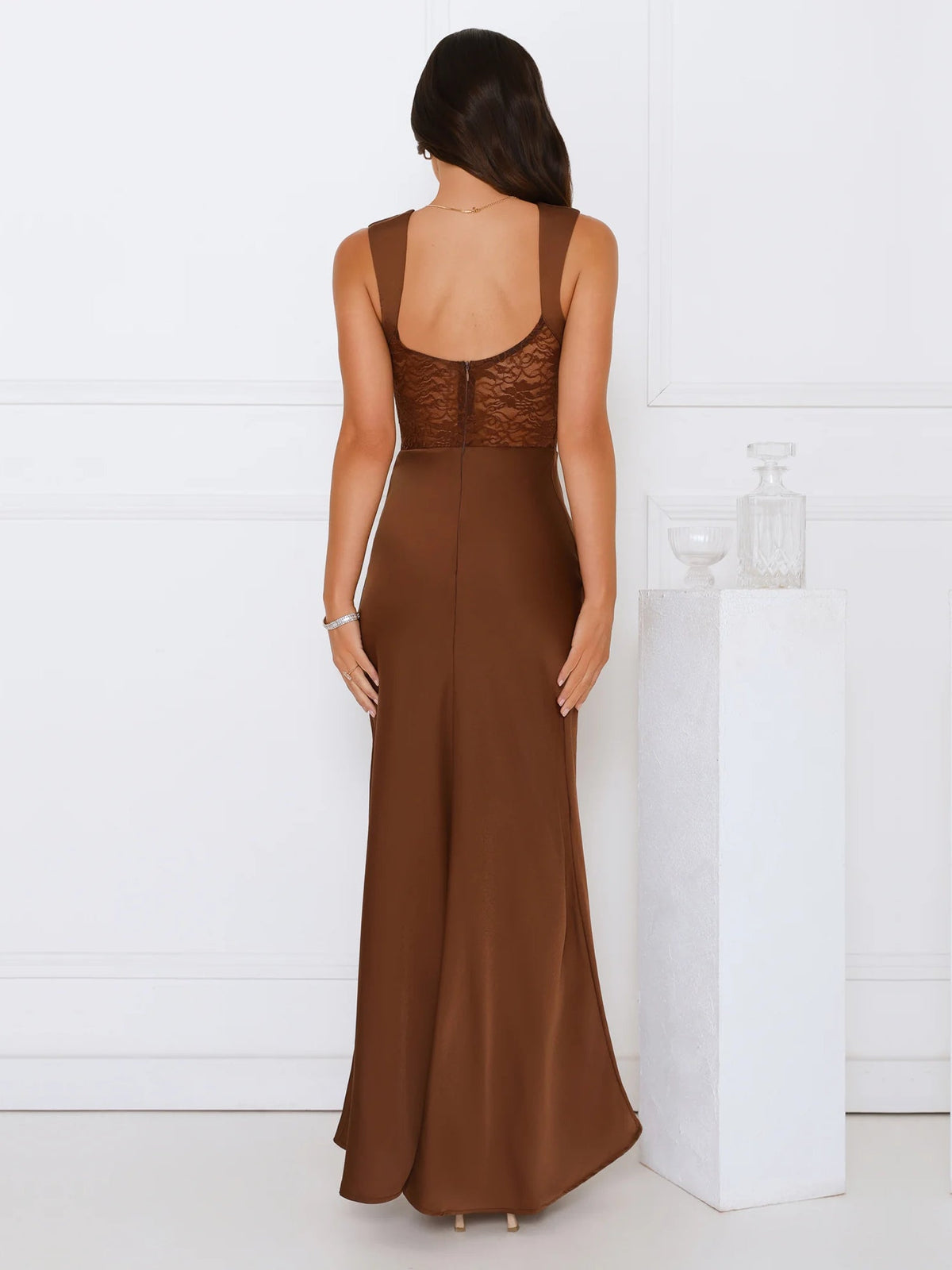 Brown sheath maxi formal dress with cutout detail, full-length back view