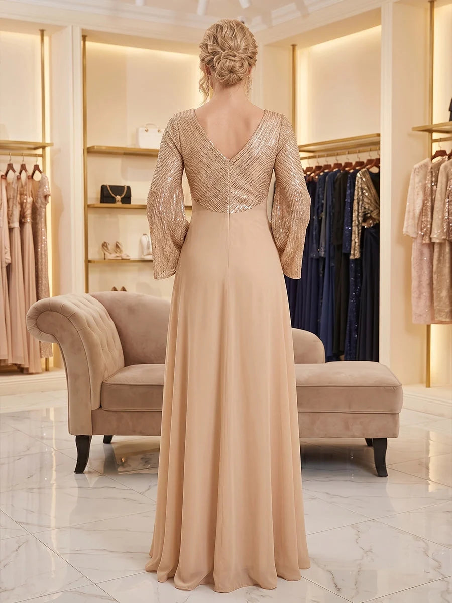 Back view: Champagne sequin long-sleeve gown with V-back and A-line chiffon skirt