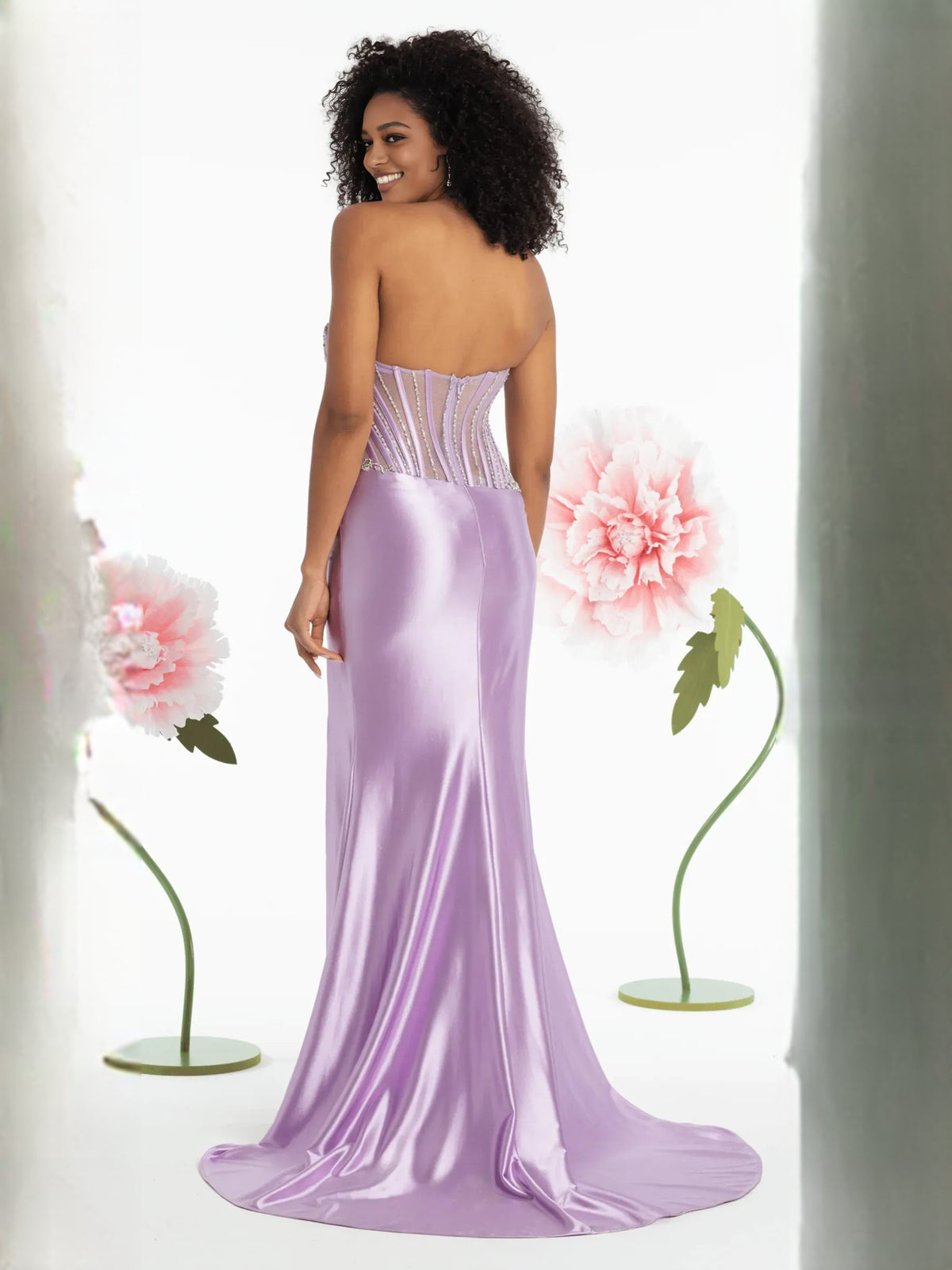 Lavender satin formal dress with rhinestone corset bodice, sheer back, and mermaid hem