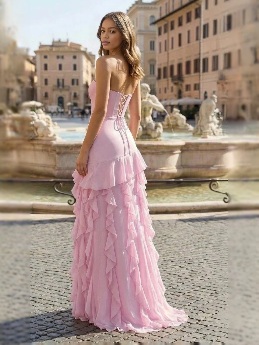 Strapless tiered ruffled prom dress in soft pink, A-line silhouette with long skirt