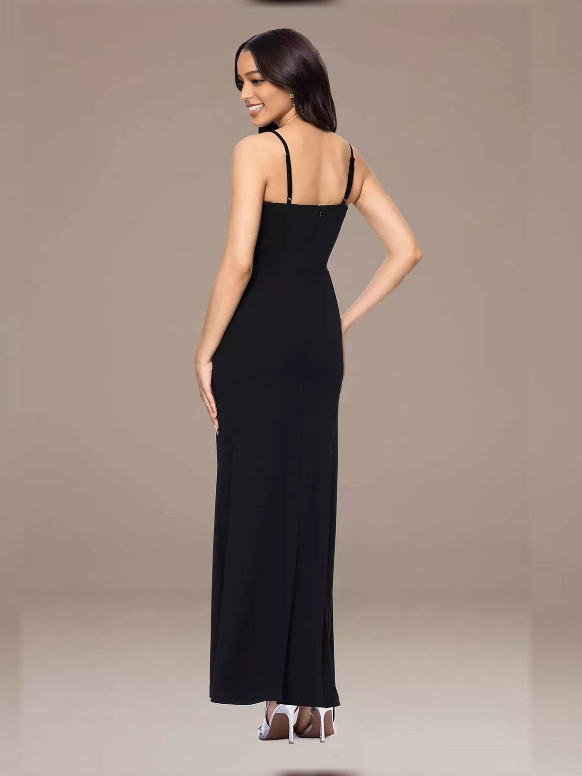 Black floor-length formal dress with spaghetti straps and open-back design