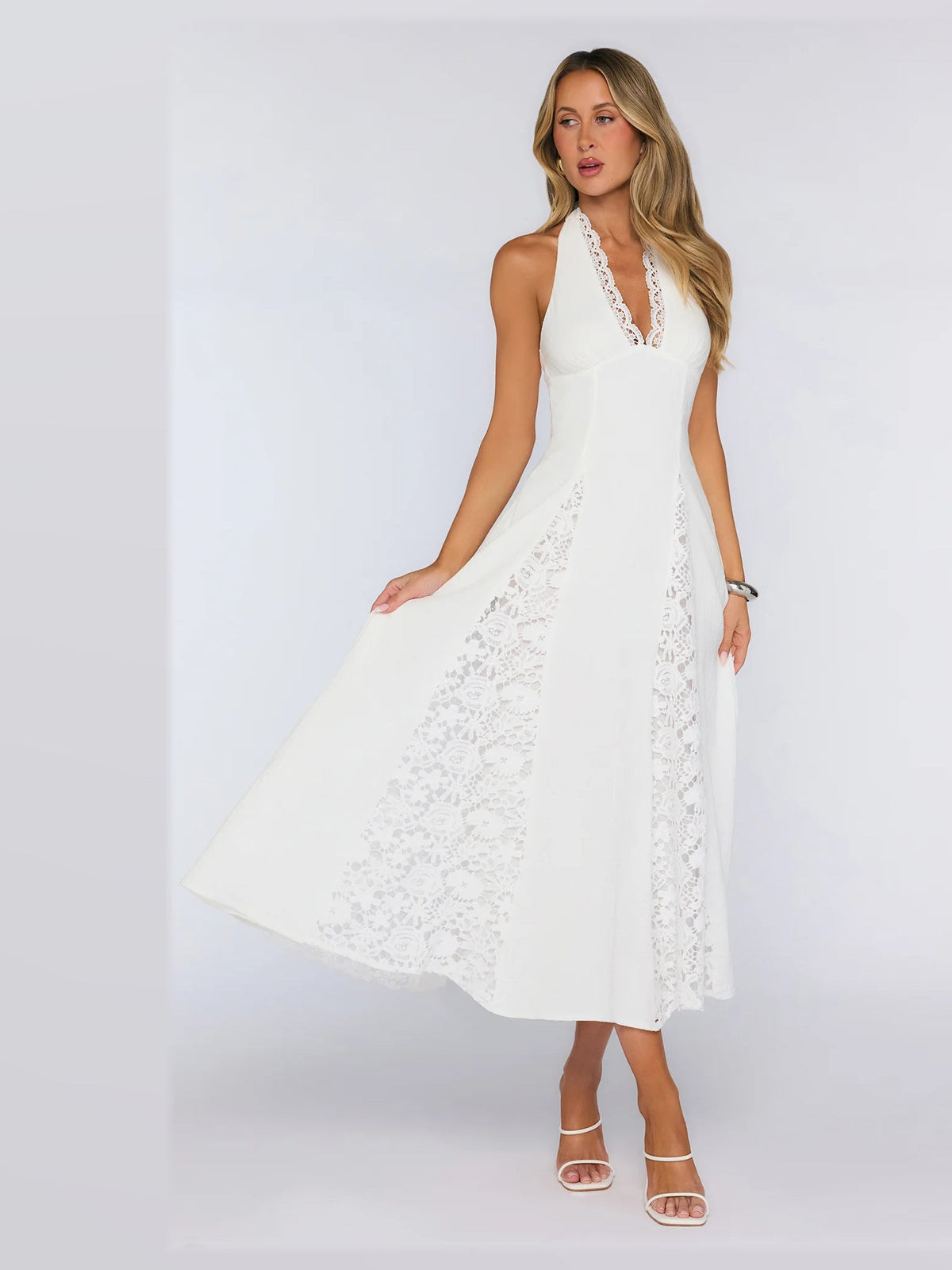 White formal dress with halter neck neckline