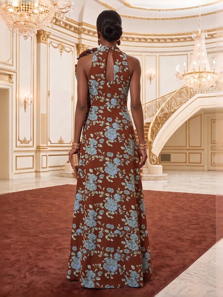 Back view floral halter maxi dress with bow cutout, teal base and brown pattern