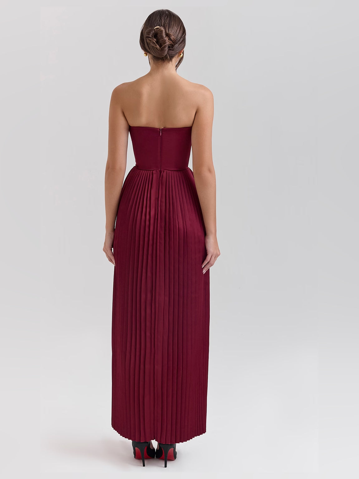 Burgundy a-line maxi formal dress with pleated skirt, full-length back view