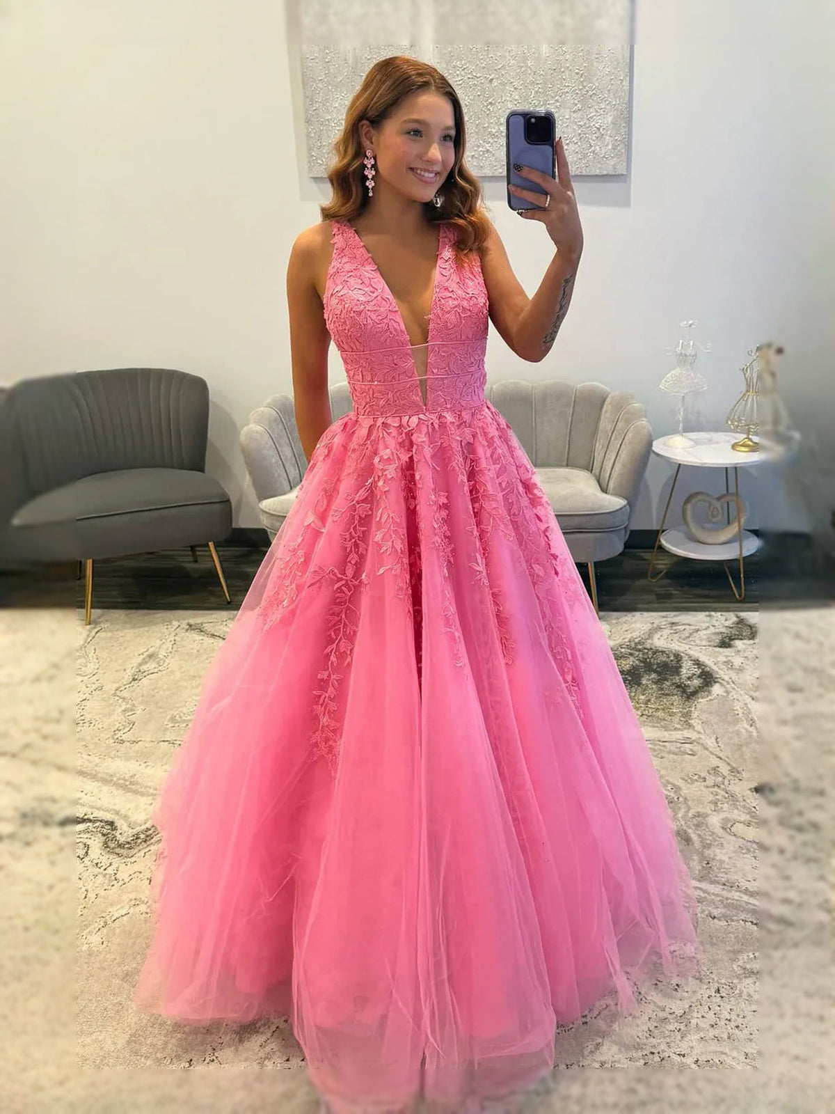 Pink V-neck A-line tulle prom dress with textured lace bodice and layered skirt
