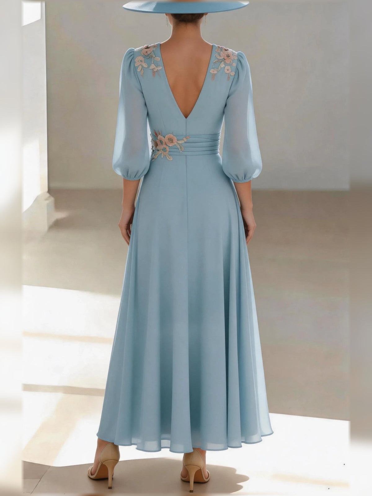 Dusty blue chiffon V-neck A-line dress with floral applique detail on bodice, 3/4 sleeves
