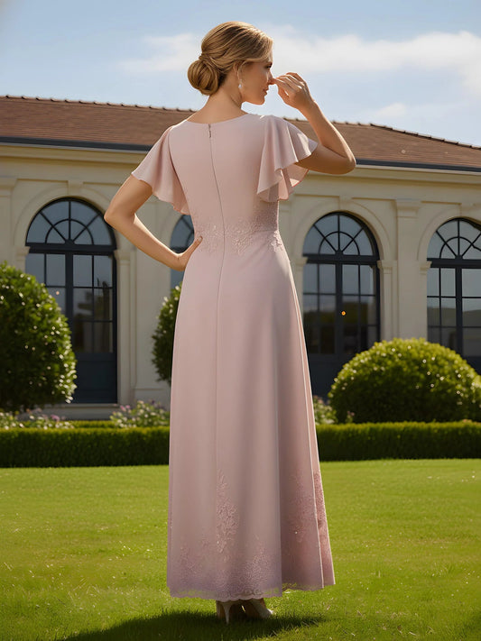 Dusty rose chiffon A-line maxi dress, side view with round back and flutter sleeves