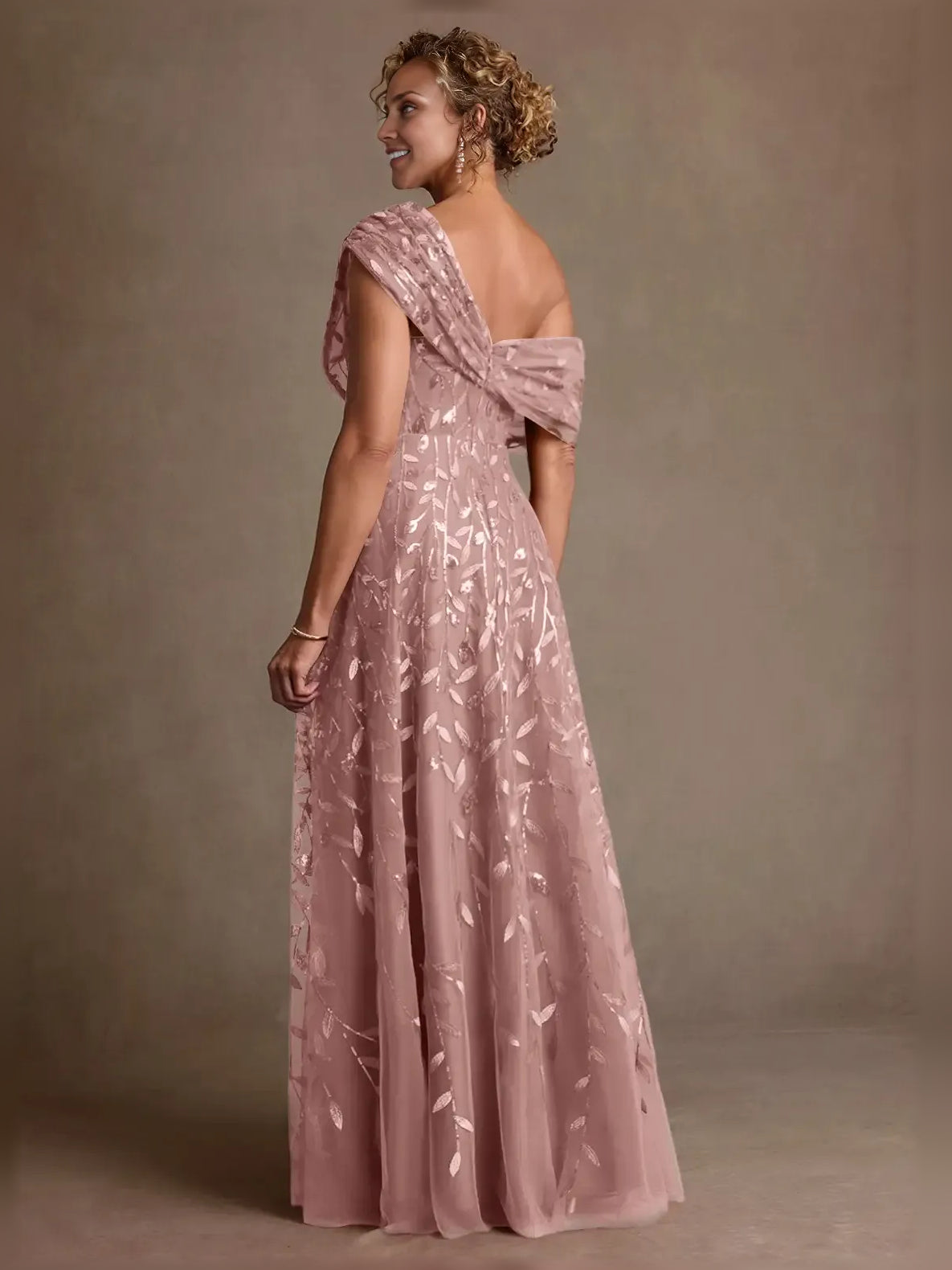 Dusty rose off-shoulder draped tulle A-line dress, side view with leaf embroidery