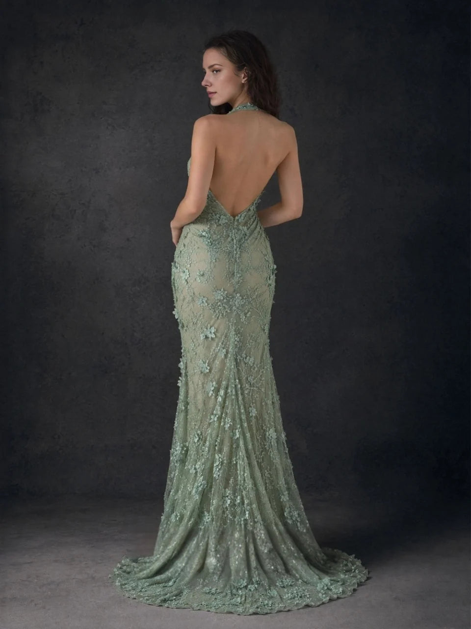 Sage green floral halter-neck formal dress, open-back detail, sweeping floor length