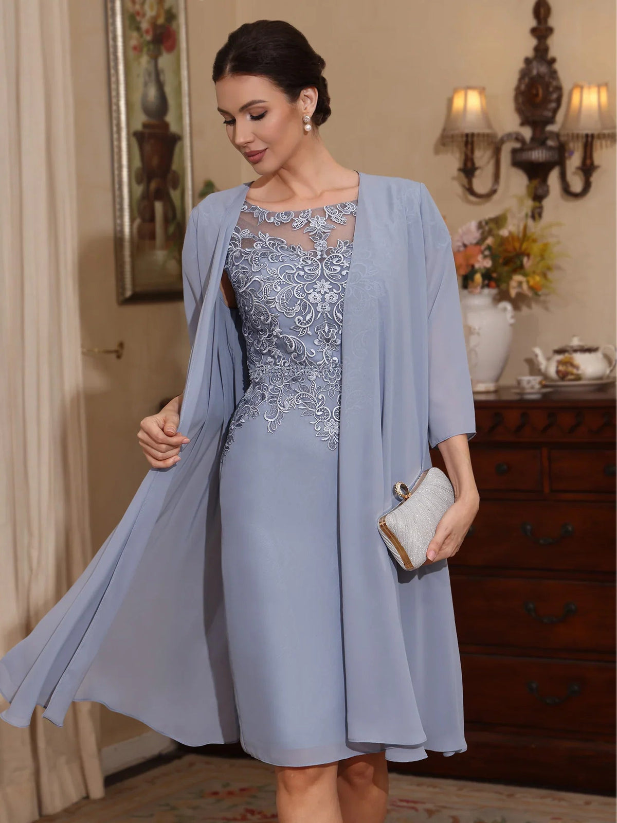 Dusty blue chiffon sheath dress with floral lace yoke, draped sleeves, knee length