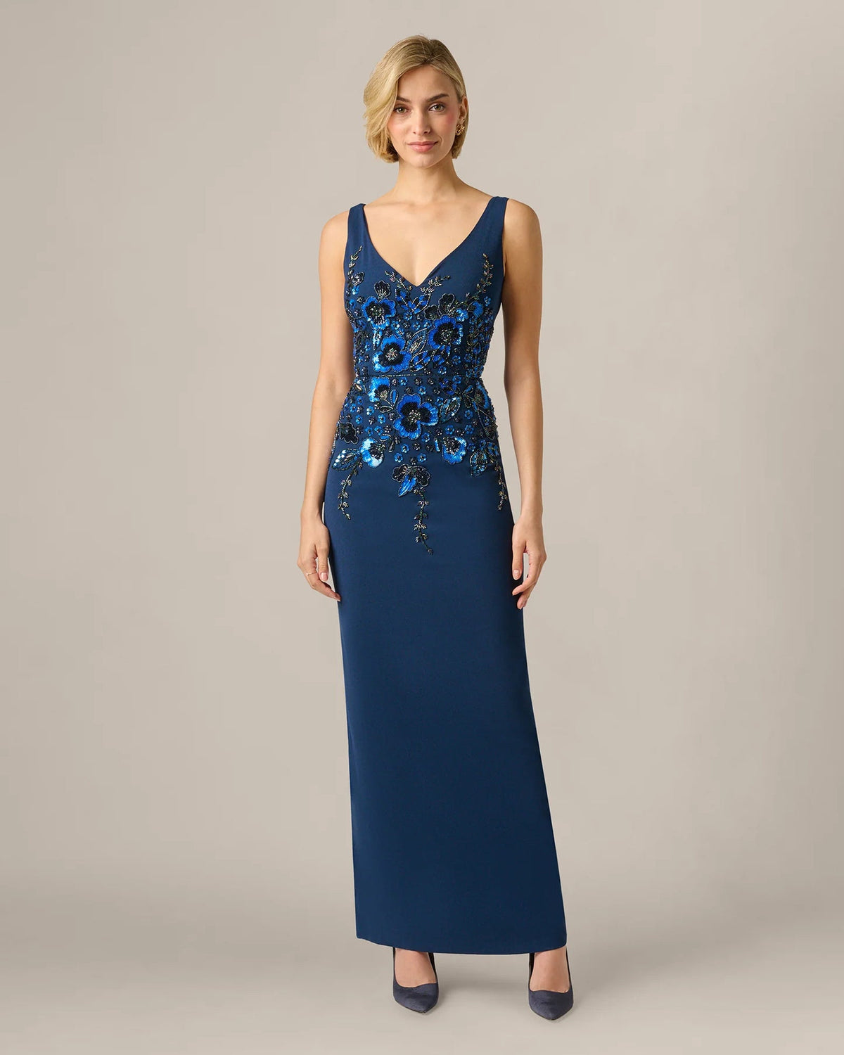 Light navy blue V-neck sleeveless maxi dress with floral sequin waist and fitted bodice