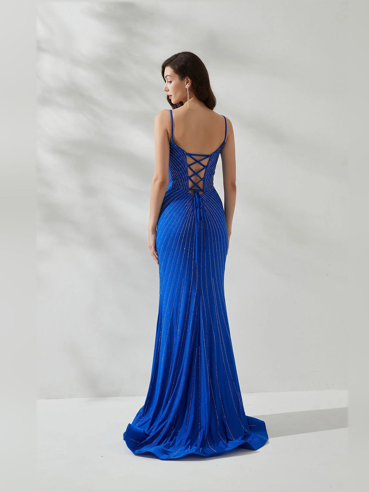 Blue sequin spaghetti strap V-neck fishtail dress with crisscross back and high slit