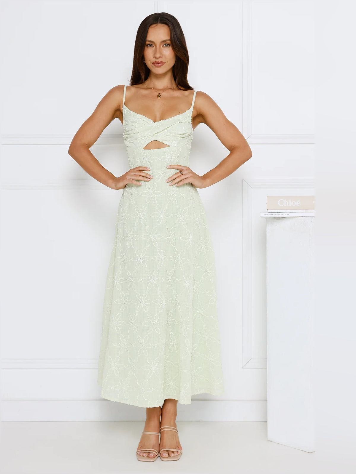 Mint midi formal dress, front view with hands on hips; spaghetti straps and scoop neckline