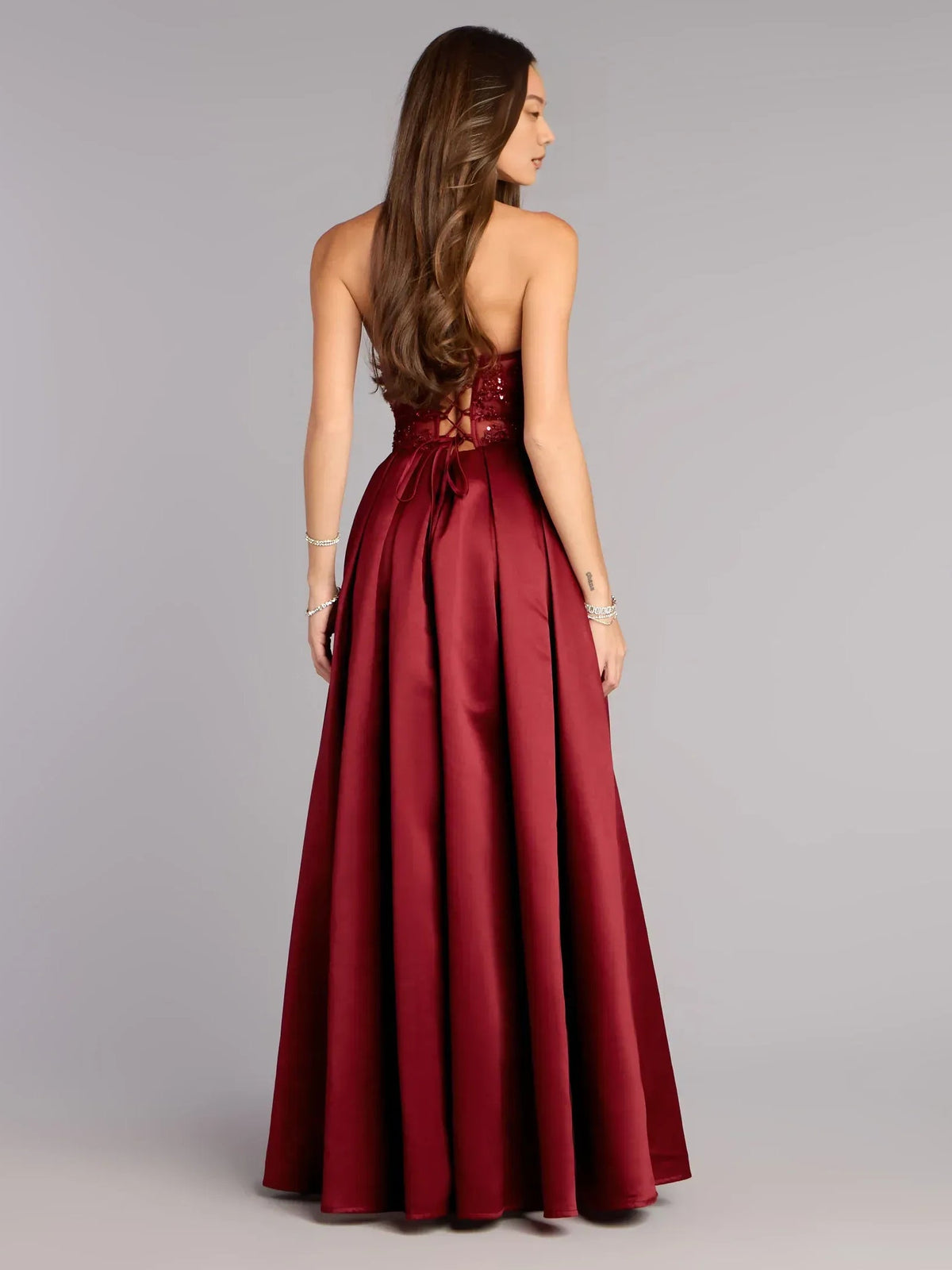 Burgundy strapless beaded mini formal dress, ruched bodice and back detail