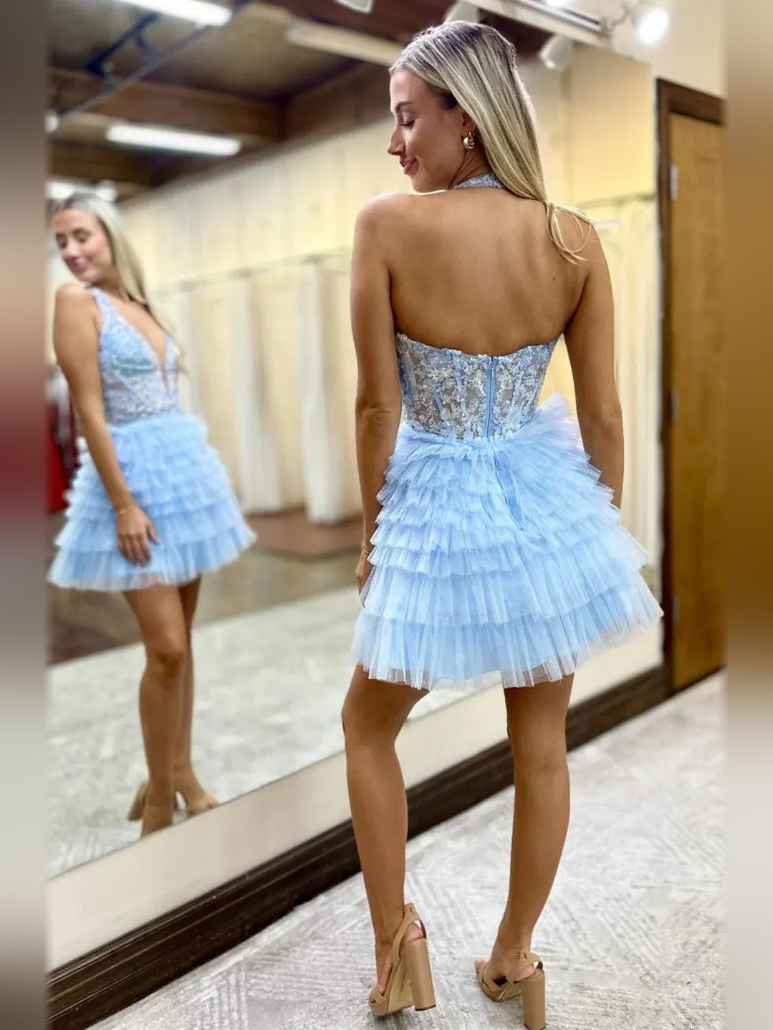Sky blue tiered tulle mini dress, open back, V-neck front and ruffled A-line skirt