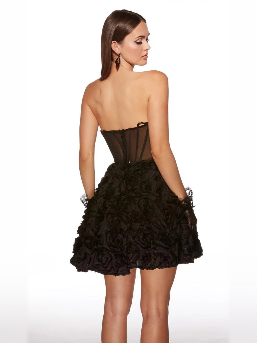 Black strapless corset mini dress with sheer paneling and layered floral ruffle skirt