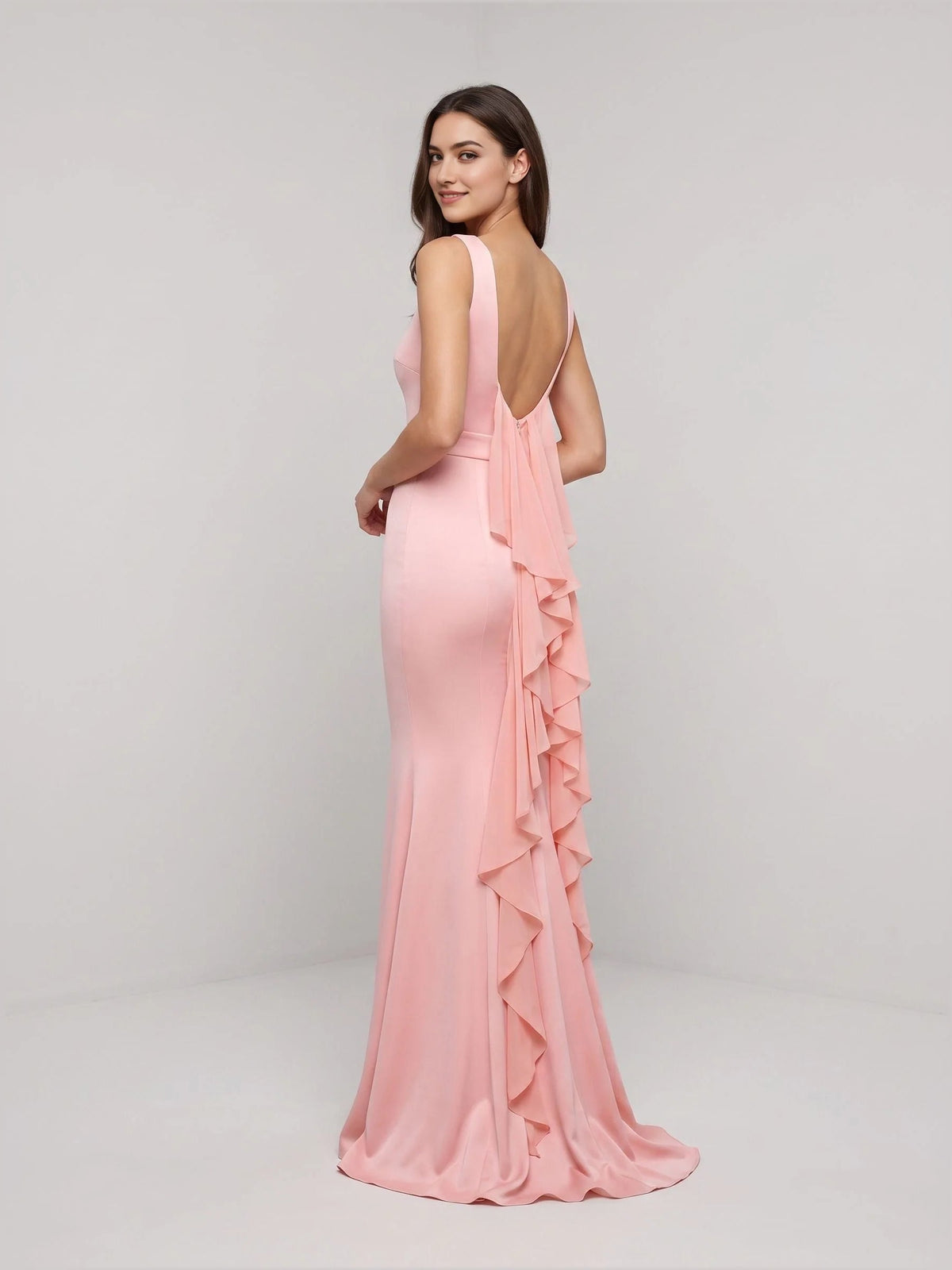 Blush pink satin mermaid dress with scoop neck and layered ruffle back detail