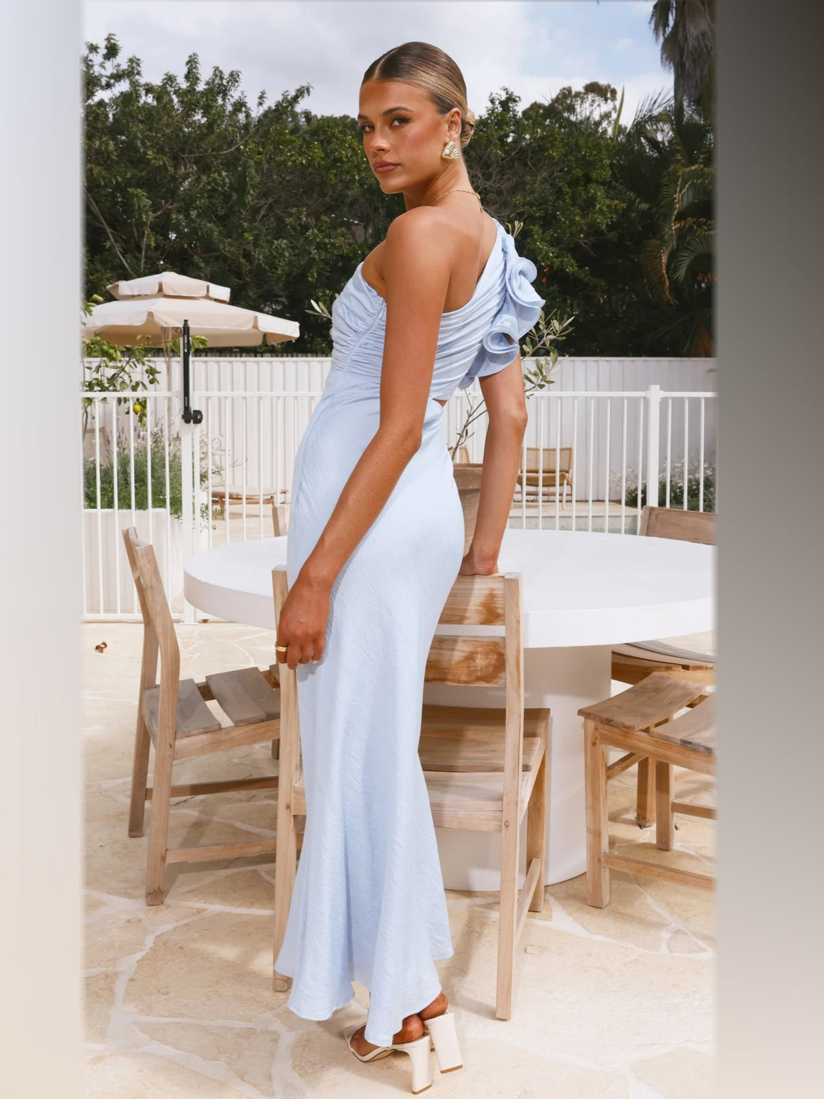 Blue maxi formal dress, back full-length view showing the bodice