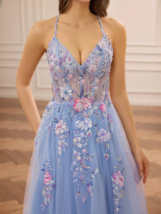Blue floral corset bodice tulle prom dress with V-neck and spaghetti straps, front view